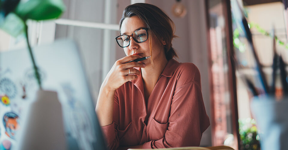 a woman works on her WordPress site